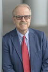 a man wearing a suit and tie
